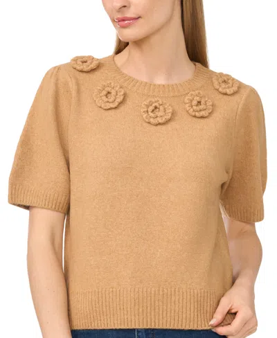 Cece Rosette Short Sleeve Sweater In Brown