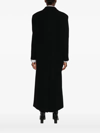 Le Sully Studio Double-breasted Peak-lapel Coat In Black