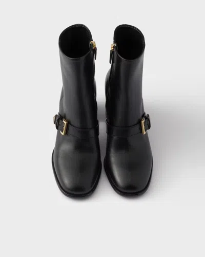 Prada Black Leather Ankle Boots In White
