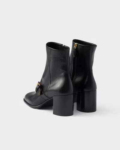 Prada Black Leather Ankle Boots In White