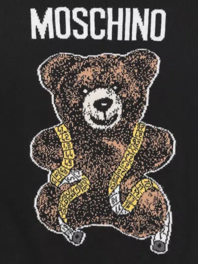 Moschino Virgin Wool Ribbed Crewneck Long-sleeve T-shirt In Black