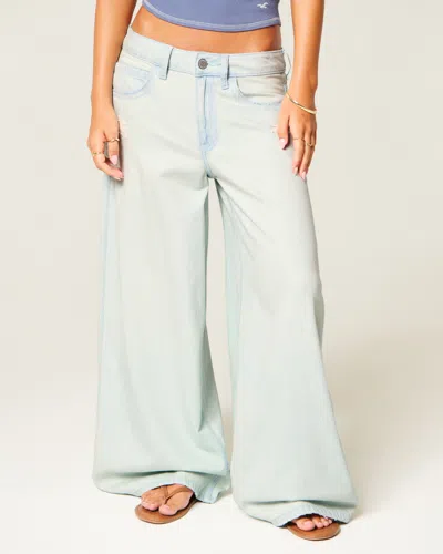 Hollister Ultra Low-rise Distressed Floral Graphic Drapey Beyond Baggy Jeans In Light Wash