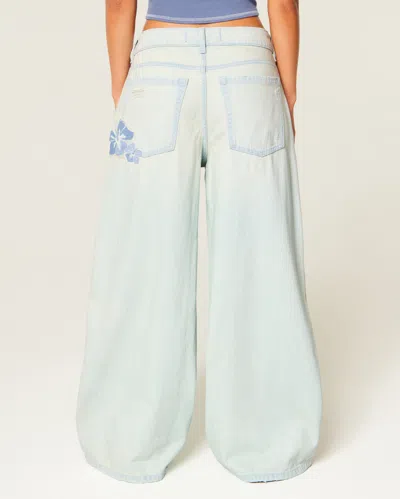 Hollister Ultra Low-rise Distressed Floral Graphic Drapey Beyond Baggy Jeans In Light Wash