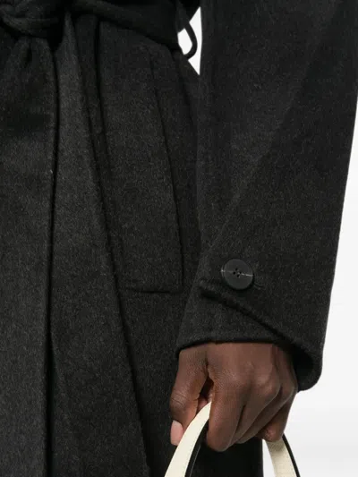 The Dynamis Studio Raglan-sleeve Button-down Coat In Black
