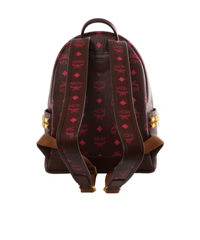 Mcm Stark Monogram-print Studded Backpack In Burgundy