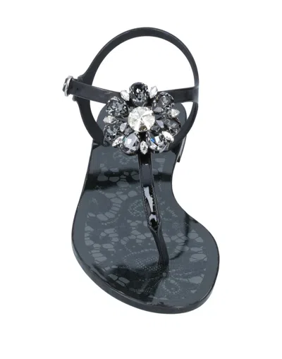 Dolce & Gabbana Solid Color Flip Flops In Black