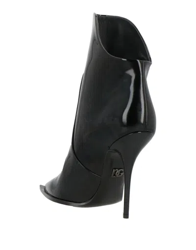 Dolce & Gabbana Solid Color Ankle Boots In Black