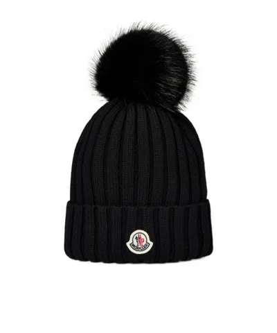 Moncler Ribbed Knit Wool Beanie With Faux Fur Pom-pom In Black