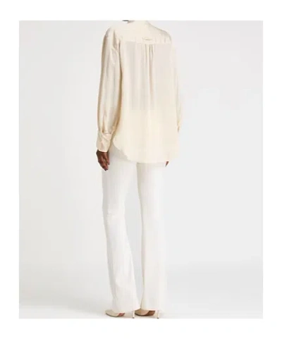 Maxco. Tops In White