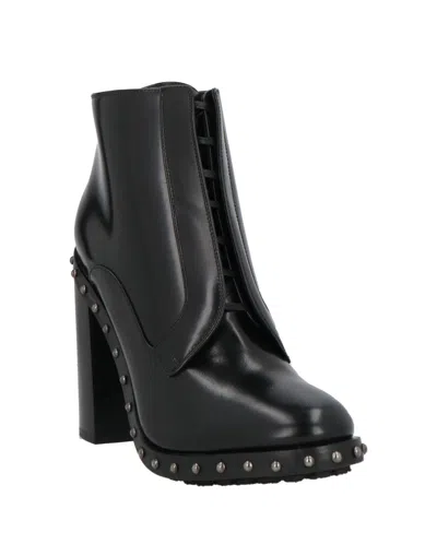Dolce & Gabbana Solid Color Ankle Boots In Red