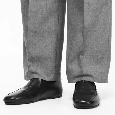 Prada Solid Color Loafers In Black