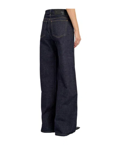 Khaite Solid Color Wide-leg Jeans In Blue