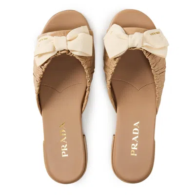 Prada Bow Flat Mules In Brown