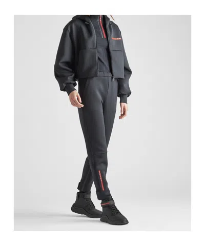 Prada Technical Knit Trousers In Black