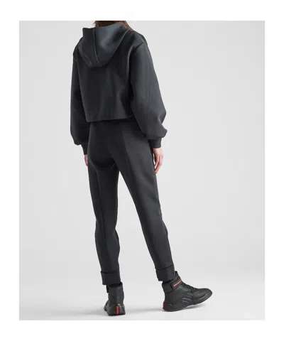 Prada Technical Knit Trousers In Black