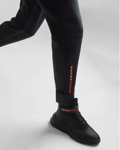 Prada Technical Knit Trousers In Black
