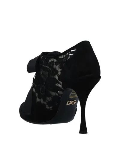 Dolce & Gabbana Solid Color Ankle Boots In Black