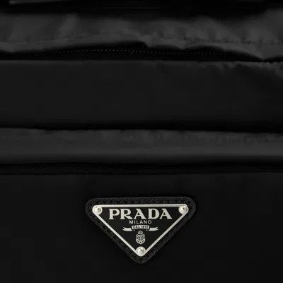 Prada Triangular Logo Backpack In Blue
