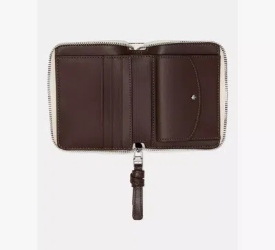 Kate Spade Loop Zip Around Wallet In Beige