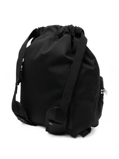 Sacai Drawstring Zip-pocket Backpack In Brown