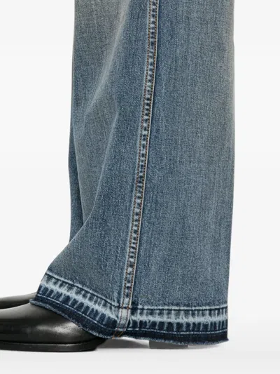 Amiri Faded-effect Bootcut Jeans In Blue