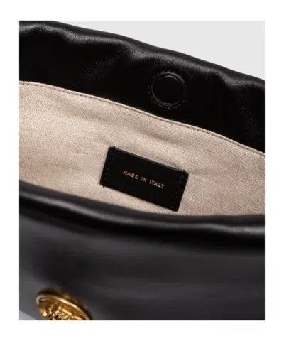 Versace Tag Drawstring Shoulder Bag In Black