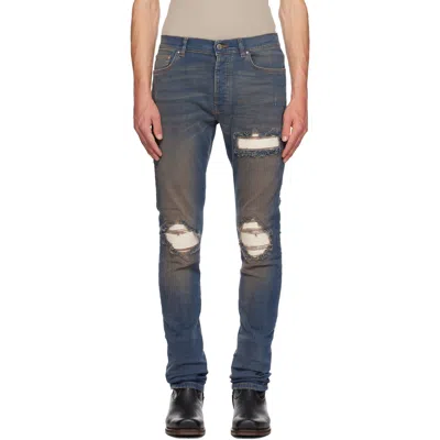 Amiri Distressed Ribbed-panel Jeans In Blue