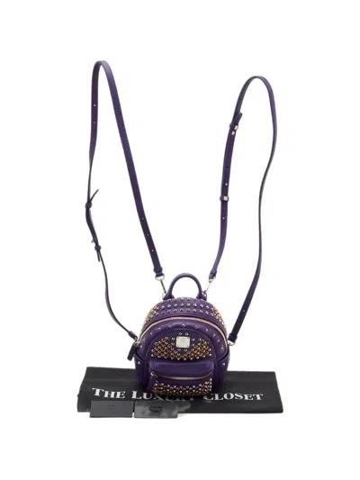 Pre-owned Mcm Stark Studded Mini Backpack In Purple