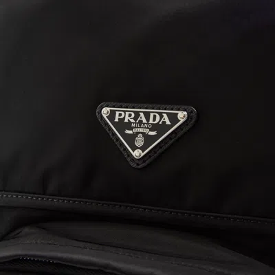 Prada Re-nylon And Saffiano Leather Backpack In Brown