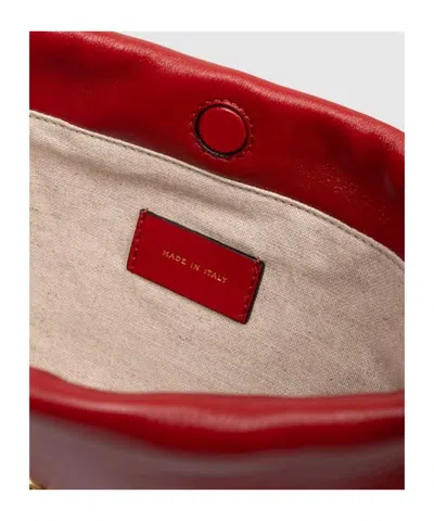 Versace Tag Drawstring Pouch Handbag In Red