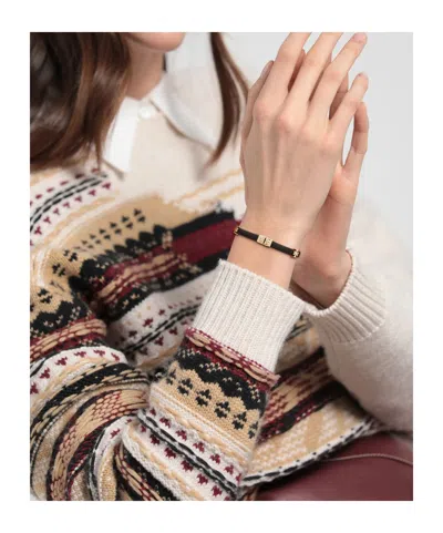 Tory Burch Hidden Clasp Bangle In Black