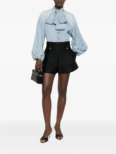 Zimmermann Valiant Tailored Button-embellished Pleated Shorts In Black