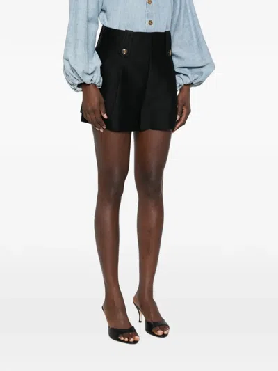 Zimmermann Valiant Tailored Button-embellished Pleated Shorts In Black