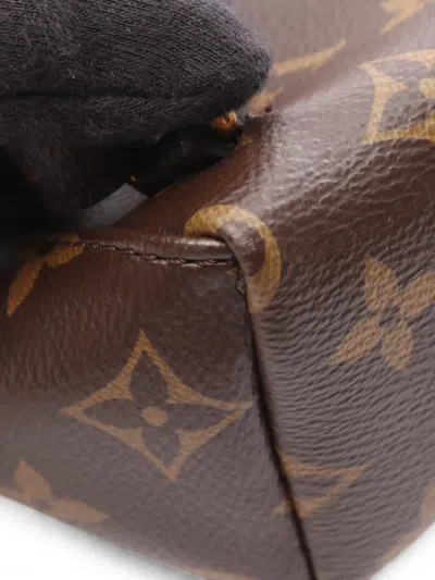 Pre-owned Louis Vuitton 2010s Pm Monogram Excursion Backpack In Brown