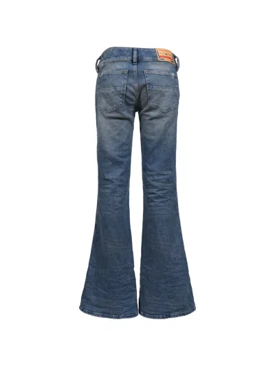 Diesel Distressed Bootcut Jeans In Blue