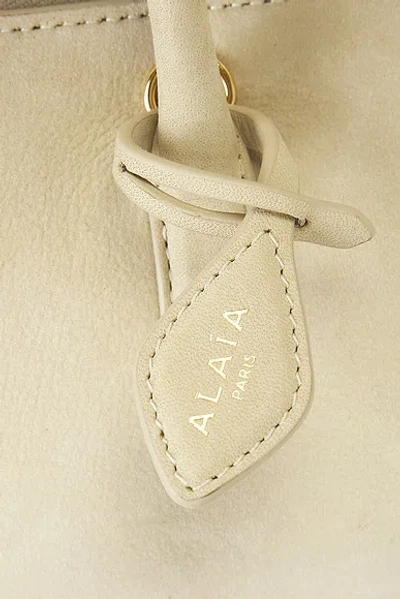 Alaïa Alaia Small Delta Bag In Vert Amande