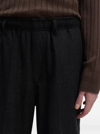 Another Aspect Pinstripe-pattern Trousers In Black