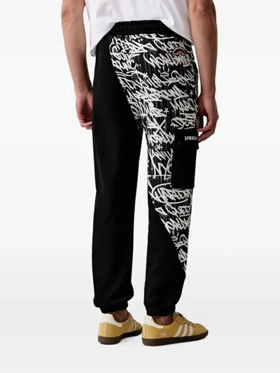 Sprayground Graffiti-print Cargo-pocket Track Pants In Black