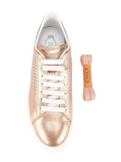 Shop Tod's Lace-up Sneakers - Metallic