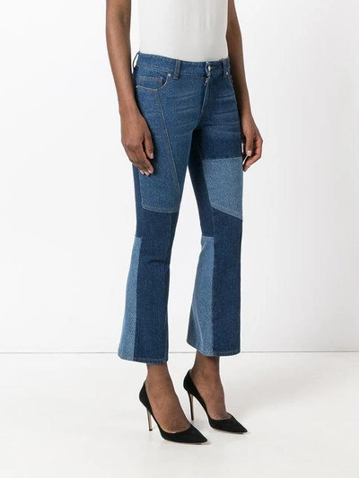 Shop Alexander Mcqueen Panelled Kick Flare Jeans In Blue