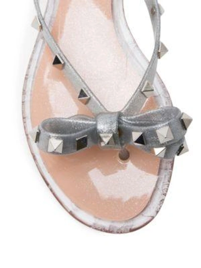 Shop Valentino Rockstud Metallic Jelly Thong Sandals In Silver