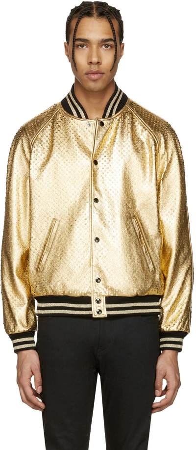 Shop Saint Laurent Gold Perforated Leather Bomber Jacket