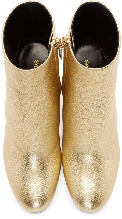 Shop Saint Laurent Gold Loulou Zipped Boots