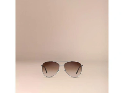 Shop Burberry Check Arm Pilot Sunglasses In Nickel