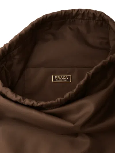 Prada Re-nylon Drawstring Bucket Bag In Brown