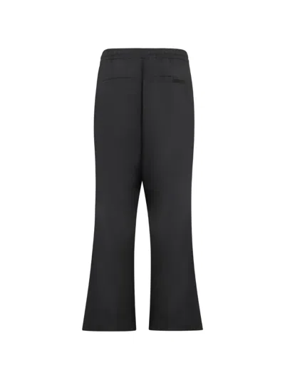 Essentials Silk-blend Pleat-front Drawstring Pants In Black