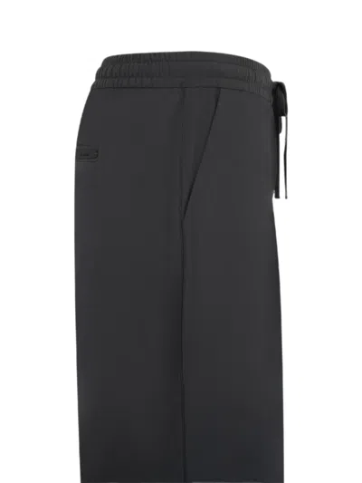 Essentials Silk-blend Pleat-front Drawstring Pants In Black