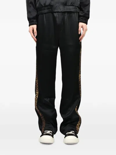 Ernest W Baker Leopard-stripe Track Pants In Black