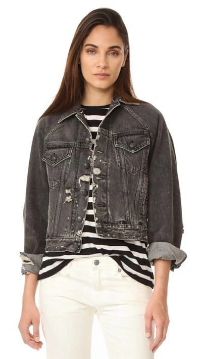 Distressed denim trucker jacket top