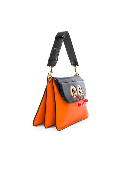 Shop Jw Anderson Medium Pierce Bag With Eyelets In Tangerine